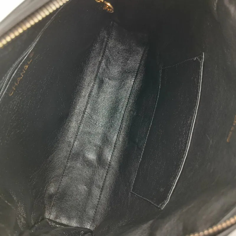 ju947-chanel-vintage-black-lambskin-quilted-camera-bag