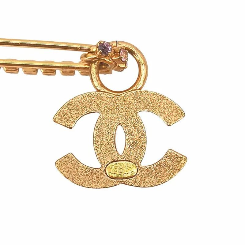 90119717-chanel-here-mark-rhinestone-brooch-pink-gold-02p
