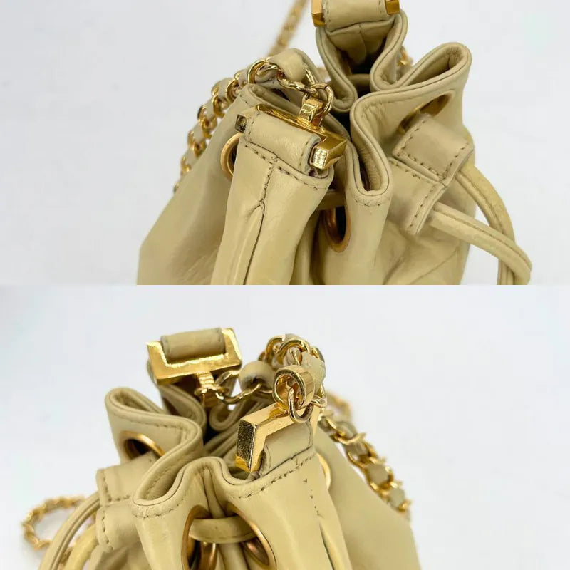 jw565-chanel-vintage-beige-lambskin-golden-ball-mini-bucket-bag