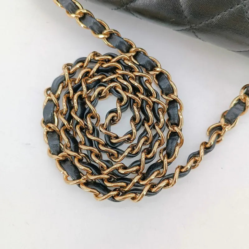 ju307-chanel-vintage-black-lambskin-flap-bag