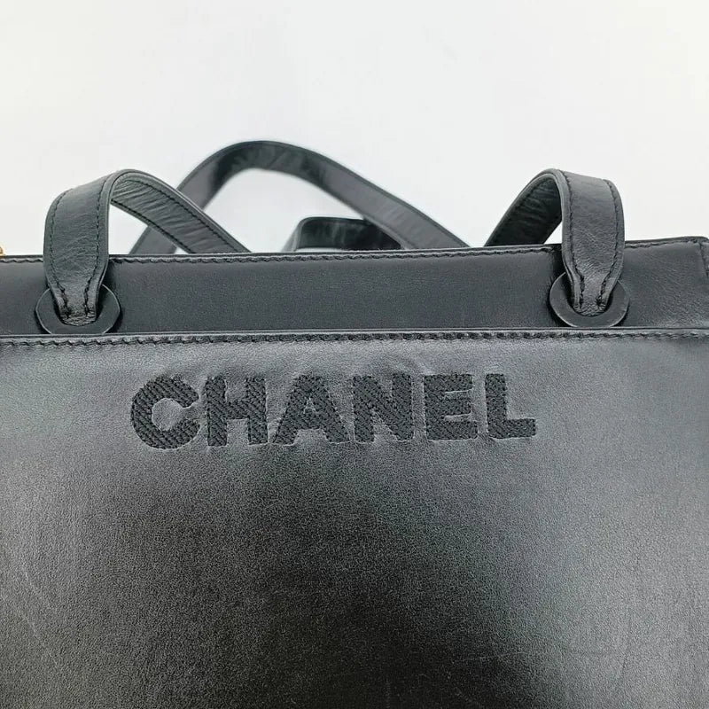 jah106-chanel-vintage-black-lambskin-embroidered-logo-tote-bag