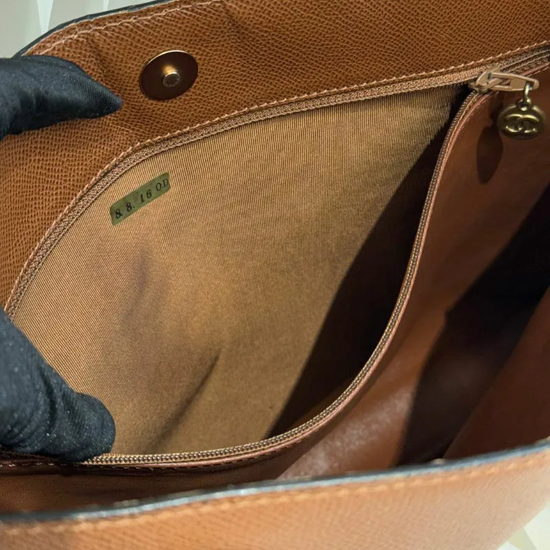 ju293-chanel-vintage-brown-caviar-leather-embroidered-logo-tote-bag