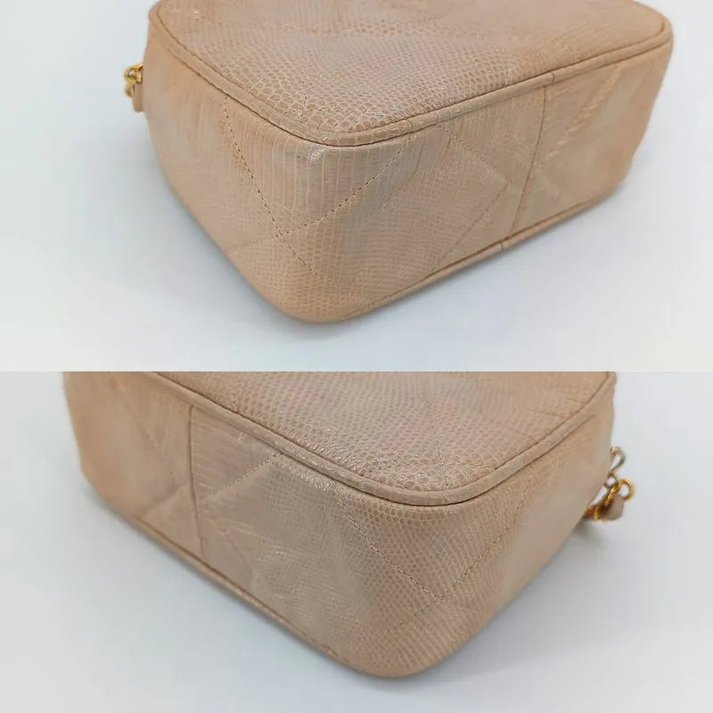 jah164-chanel-vintage-pink-lizard-skin-tassel-camera-bag