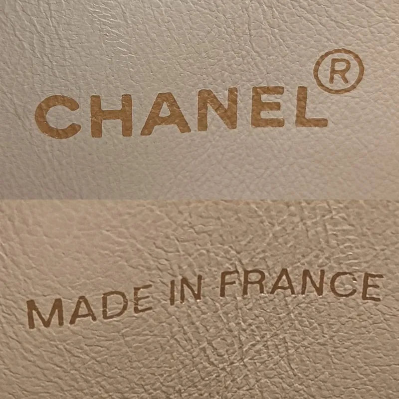 jah126-chanel-vintage-beige-lambskin-tassel-camera-bag