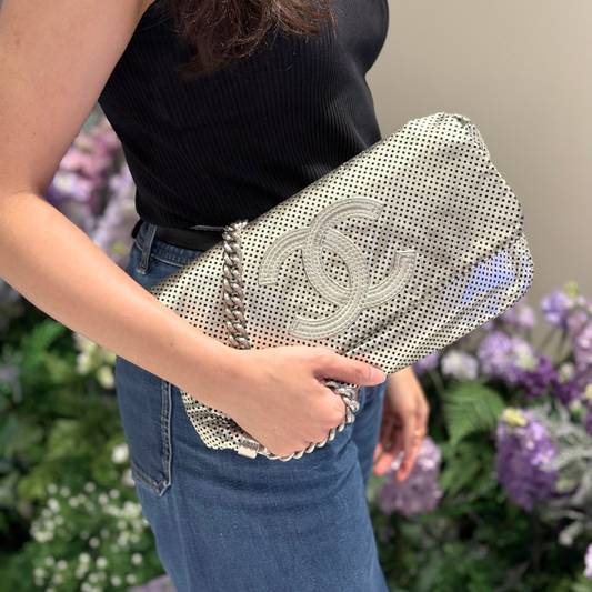C664 - CHANEL Metal Silver Perforated Leather Rodeo Drive Flap Bag