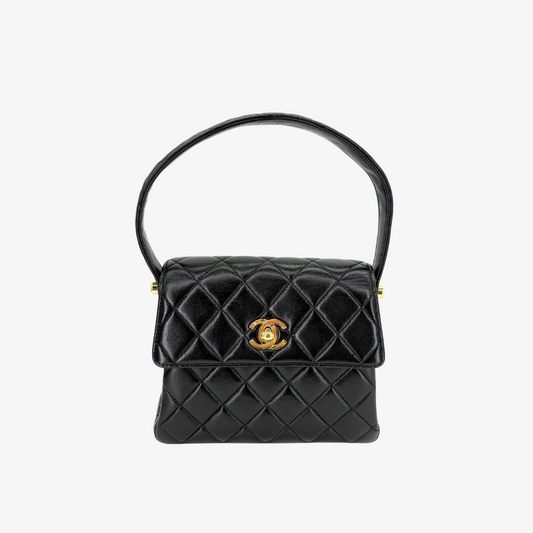 RG742 - CHANEL Vintage Black Lambskin Mini Kelly HandBag